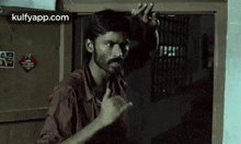 What.Gif GIF - What Dhanush Hand Action GIFs