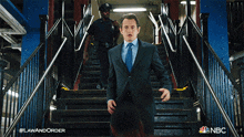 Going Down The Stairs Executive Ada Nolan Price GIF - Going Down The Stairs Executive Ada Nolan Price Law & Order GIFs