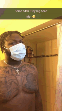 a shirtless man wearing a face mask in a bathroom
