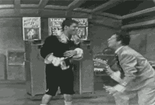 Dean Martin Jerry Lewis GIF - Dean Martin Jerry Lewis Jump GIFs