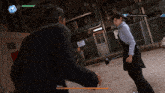 a man and a woman are fighting in a video game with ex actions unleashed at the top of the screen