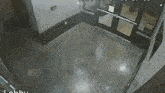a security camera shows a person walking into a building