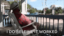 a man sitting in a rocking chair with the words i do beleive it worked