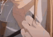 a close up of a person 's neck and necktie .