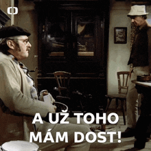 a man sitting in a chair with the words a uz toho mam dost written on the bottom