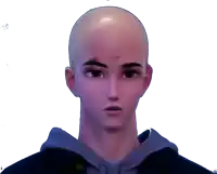 a man with a shaved head wearing a hoodie