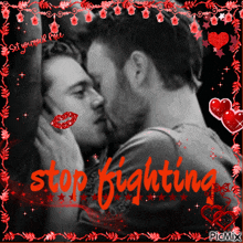 a black and white photo of two men kissing with the words stop fighting in red
