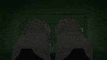 a pair of white shoes with a red stripe on the side