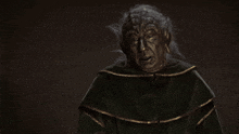 a poster for spaceballs 2 shows a man in a black cloak