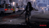 a zombie walking down a street with a motorcycle in the background and the words zombie rampaging rising on the bottom right