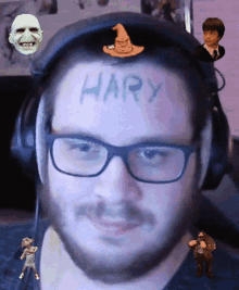 a man with glasses and a beard has the word harry written on his forehead