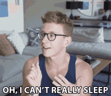 a man wearing glasses says " oh i can 't really sleep "