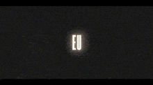 the word mae is glowing in the dark on a black background