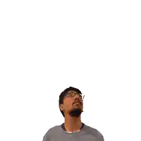 a man with glasses and a beard is looking up at the number 19