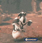 a video game character is sitting on top of a bb-8 ball with a dismount sign below him