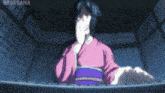 a woman in a pink kimono is covering her mouth with her hand and the words ndds sama are visible behind her