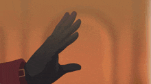 a person 's hand is reaching for a door handle