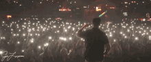 pointing hype crowd phone lights lights