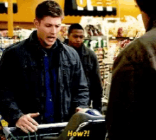 a man is pushing a shopping cart that says how