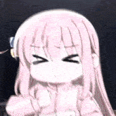a little girl with pink hair is making a funny face .