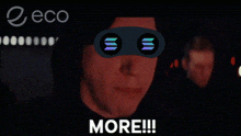 a man is wearing a mask with the word more on the bottom