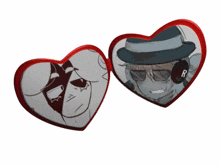 a heart shaped mirror with a picture of a man in a hat and sunglasses