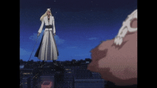 a man with a sword is standing on a rooftop with a skull in the background
