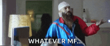 a man with a beard and headphones is dancing in a living room and says whatever mf .