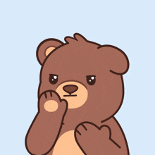 a brown teddy bear is covering his nose with his paw