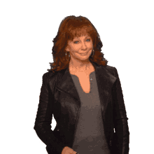 smirk reba mcentire smile happy smug look