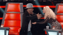 Hug GIF - Pharrell Christina Aguilera The Voice GIFs