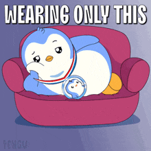 a penguin is laying on a couch with the words wearing only this