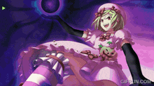 a gif from gifrun.com shows a girl in a pink dress holding a ball