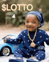 a baby wearing a bandana and a necklace is sitting next to a toy car with the word lotto written on it
