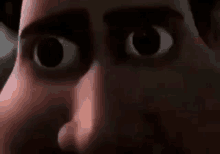 a close up of a cartoon character 's face with big eyes and a mouth open .