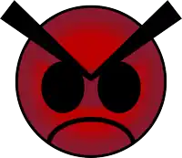 an angry red smiley face with black eyes