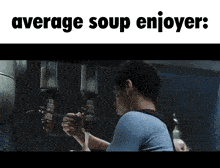 a man in a blue shirt is pouring average soup
