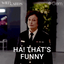 a woman in a military uniform says ha that 's funny