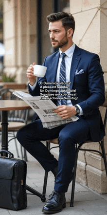 a man in a suit sits at a table with a cup of coffee and a newspaper