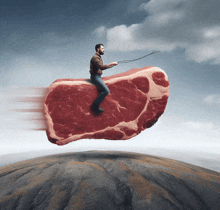 a man is riding a large piece of meat on a rope