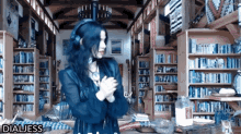 a woman wearing headphones stands in a library with the name dialjess written on the bottom