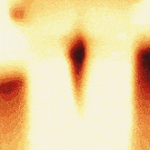a silhouette of a person with their arms outstretched against a bright orange background