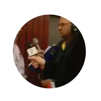 a man is being interviewed by a reporter with the name koffer written above him