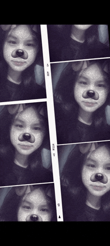 a girl is wearing a dog mask and has a sticker on her face that says ' a ' on it