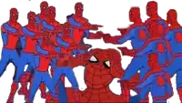 a group of spider men are standing around a spider man laying on the ground .