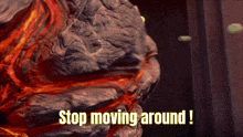 a picture of a rock with the words " stop moving around " on it