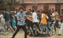 kollywood ka baap is written on the bottom of a picture of a crowd of people