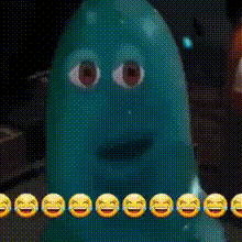 a green ghost with smiley faces behind it .