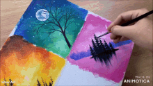 a painting of the four seasons is being painted with a brush