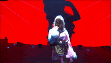 a woman wearing a belt that says world heavyweight champion